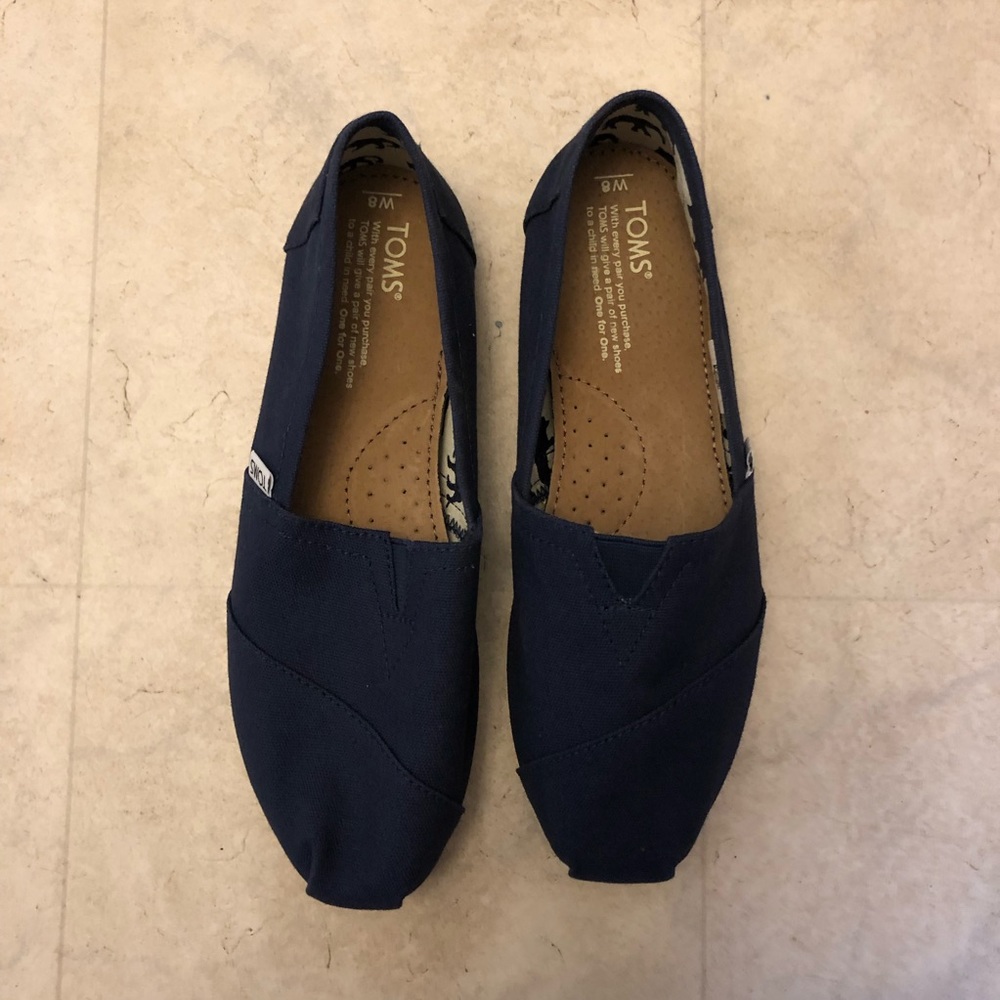 TOMS slip on shoes-  brand new